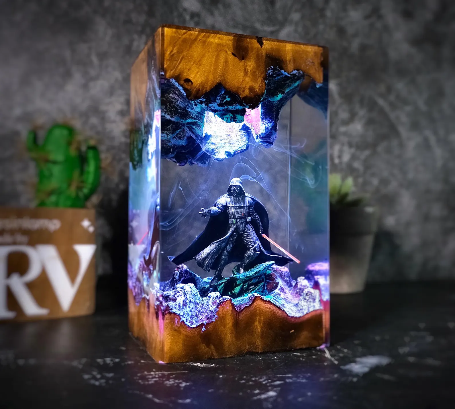 Vader resin lamp lit on a desk